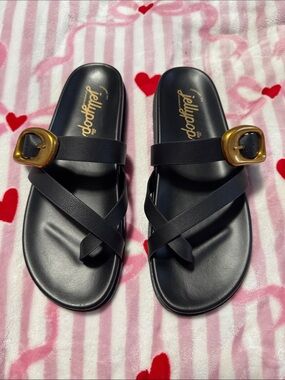 Jellypop Black Slide Sandals with Gold Buckle Accent